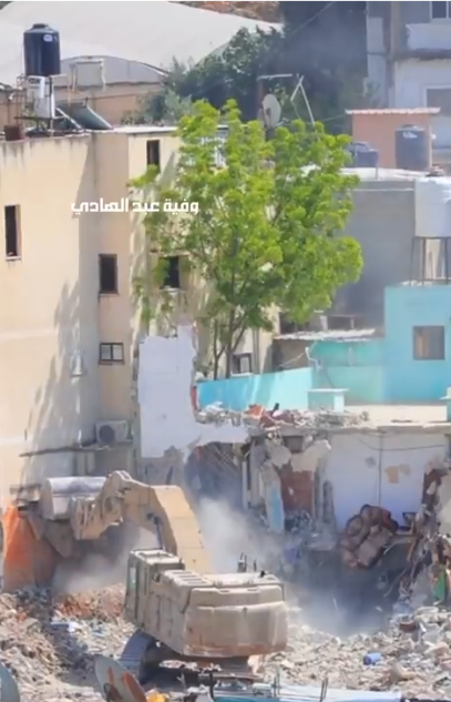 Destruction de maisons dans le camp de réfugiés de Nur Shams